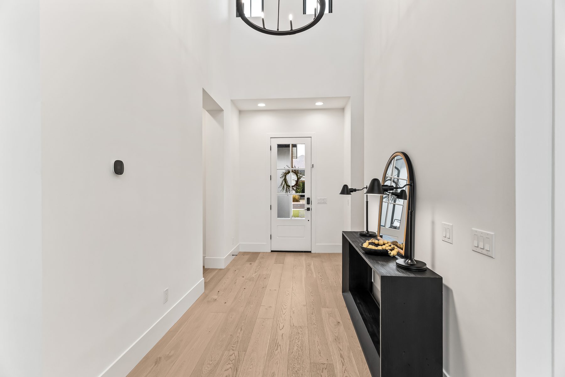 Entry foyer with vaulted ceiling and wood flooring at 5513 E Verde Lane, Lower Arcadia